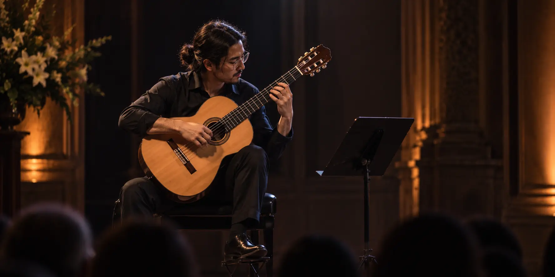 Classical guitarist performing on a concert stage
