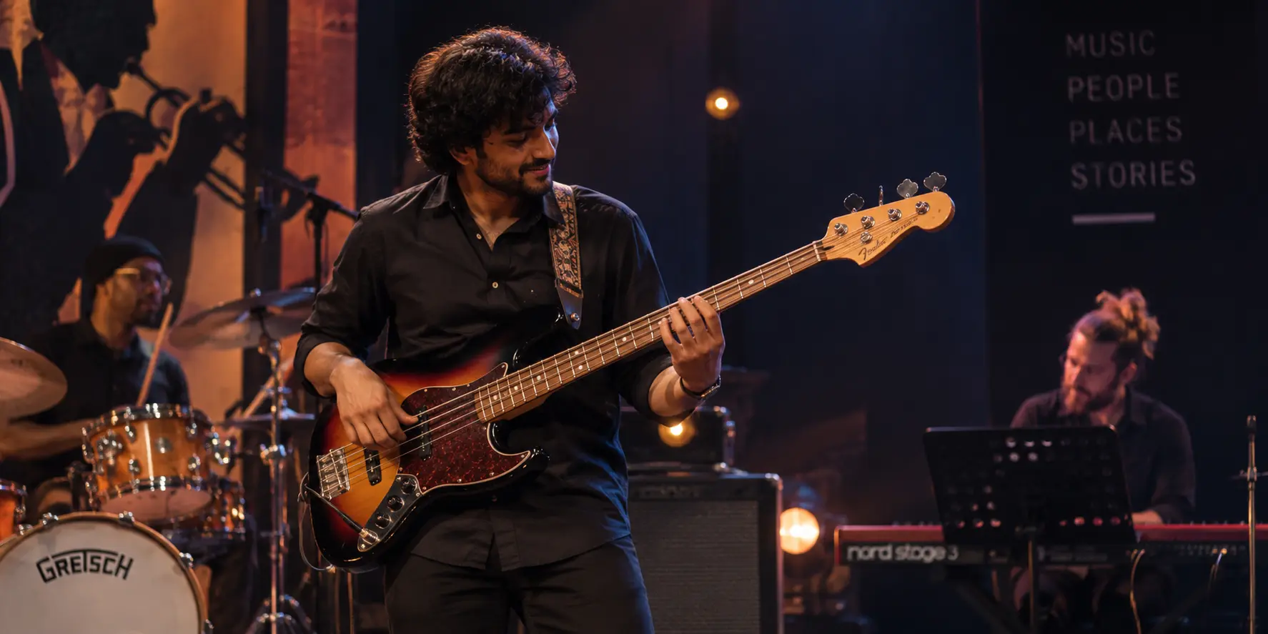 Bass guitarist performing with a live band